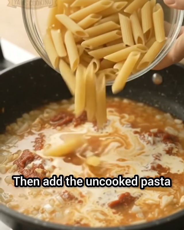 Chicken cheese pasta in a skillet